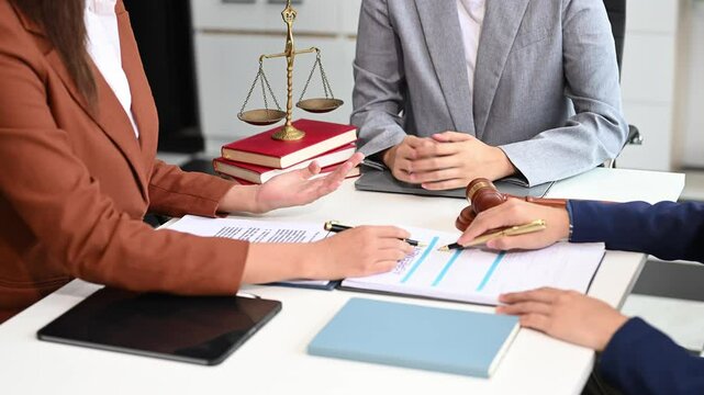 Business and Male lawyer or judge consult having team meeting with client, Law and Legal services concept.