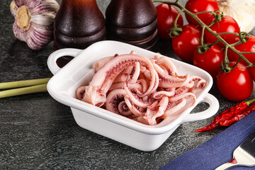 Delicous marinated squid tentacles in the bowl
