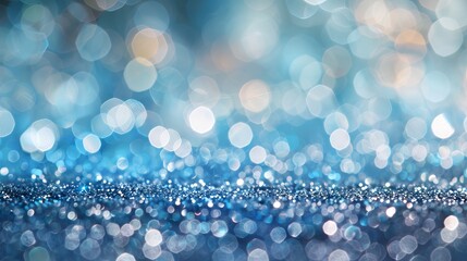 Abstract blue sparkle glitter background with shimmering light effects and vibrant highlights