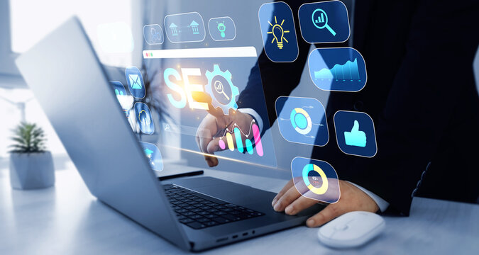 Search engine optimization marketing and online traffic on website.Business person who using a computer for analysis SEO. Attract organic traffic,boost visibility and dominate search engine ranking.