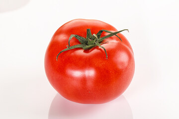 Ripe tasty and juicy tomato isolated