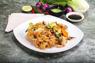 Asian cuisine - Fried noodles with seafood