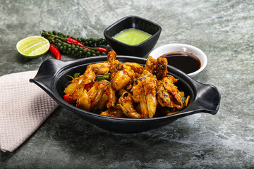 Vietnamese cuisine - fried frog with vegetables