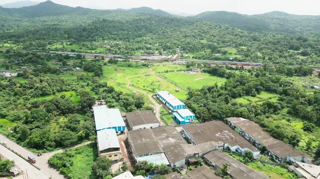trains transportation near vasai station drone shot in mumbai in india