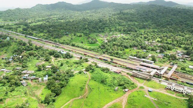 trains transportation near vasai station drone shot in mumbai india