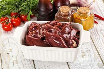 Raw chicken liver uncooked in the bowl