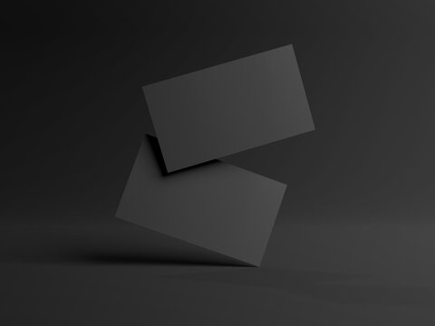Two black business cards floating on black background Mockup. Blank american size calling card. 3D rendering