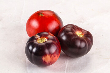 Black ripe juicy organic tomato