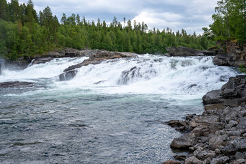 Målselvfossen waterfall in Norway in summer