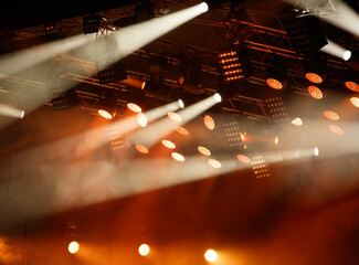 Red-orange color on stage at a concert