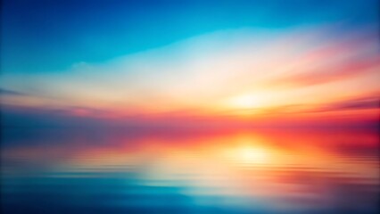 Obraz premium A softly blurred, grainy gradient artwork that transitions from cool blues to warm reds, creating a serene and calming effect.