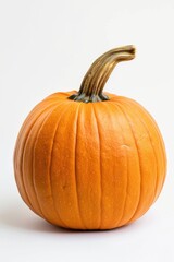 A single small orange pumpkin sitting on a white background, perfect for fall or harvest-themed designs