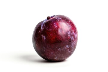 Obraz premium A close-up shot of a juicy red apple on a white surface, perfect for food photography or illustration