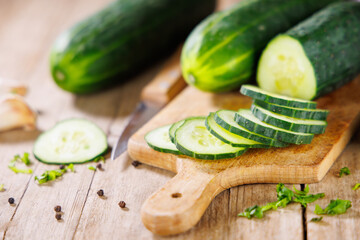 Sliced Cucumber on Wooden Board – Fresh Ingredient for Healthy Meals
