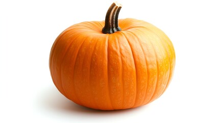 Obraz premium A whole orange pumpkin isolated on a white background.
