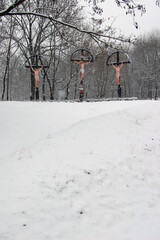 Snowy hill with crosses