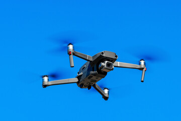 Drone fly in the blue sky. Drone Filming View. High quality photo.