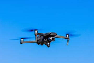 Drone fly in the blue sky. Drone Filming View. High quality photo.