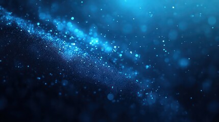 A mesmerizing swirl of blue particles, creating a dreamy underwater effect in a captivating and ethereal composition.