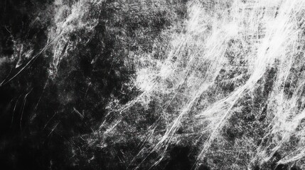 An abstract black and white texture with dynamic, swirling patterns, evoking a sense of movement and emotion.