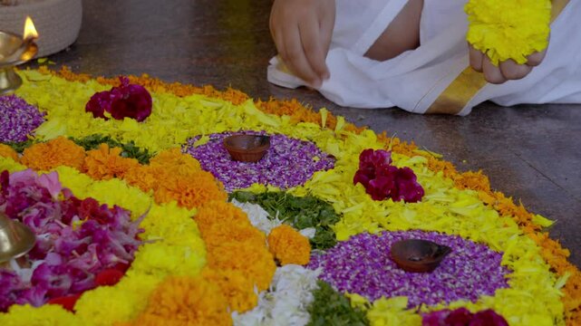 Athapookkalam decorating for onam festival in Kerala ,pookalam decorating Kerala traditional family for onam celebration