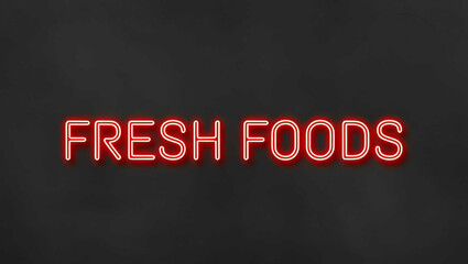 Obraz premium Fresh Foods red neon lettering on plain black dark background