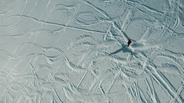 Freeride snowboarding in winter. Heliboarding freeride. Riding in powder on snowborad. Ski, Snowboard freeride i deep powder snow. Gudauri Georgia Caucasus resort. Freeride in Caucasus mountains. 