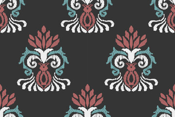 Embroidered Ikat flower pattern on a black background. Traditional ethnic ikat, Aztec abstract vector pattern, seamless pattern in tribal, folk embroidery and Mexican style.