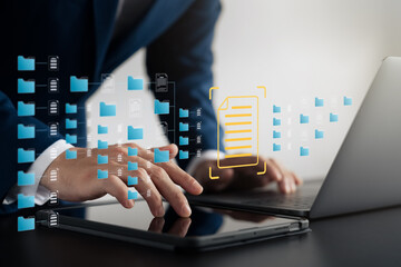 DMS document management system, company employees manage folders via laptops, search for files, online document databases, document software, corporate data files.