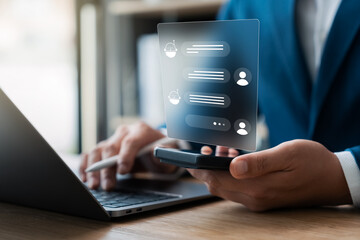 Businessmen use smartphones and laptops with AI applications to help them optimize their work to achieve smart results, Machine Learning and Deep Learning.