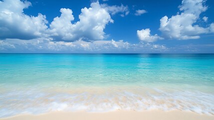 Obraz premium Idyllic tropical beach with crystal clear turquoise water and white sand.