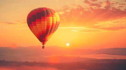 Fototapeta premium Hot Air Balloon at Sunrise: A vibrant hot air balloon floating gracefully in the sky at sunrise. 
