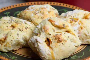Stuffed savory bread to eat for breakfast, on a plate, delicious