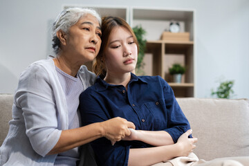 Granddaughter consoled and encouraged her grandmother with love.