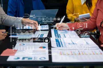 Business team using a calculator to calculate the numbers of statistic business profits growth rate...