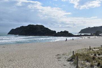Maunganui beach and mountain with stunning views over the turquoise blue water in Tauranga, New Zealand