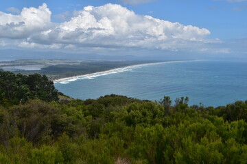 Maunganui beach and mountain with stunning views over the turquoise blue water in Tauranga, New Zealand
