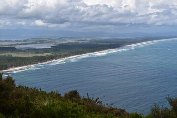 Maunganui beach and mountain with stunning views over the turquoise blue water in Tauranga, New Zealand