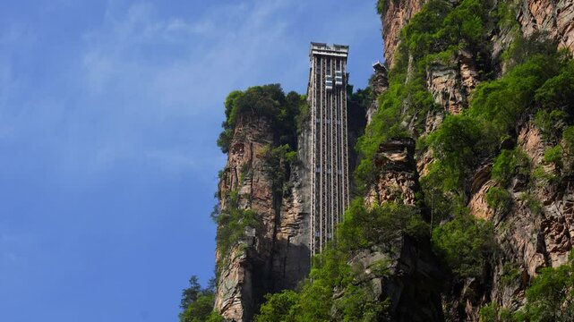 Bailong Elevator cabin going up and down in Zhangjiajie National Park, China