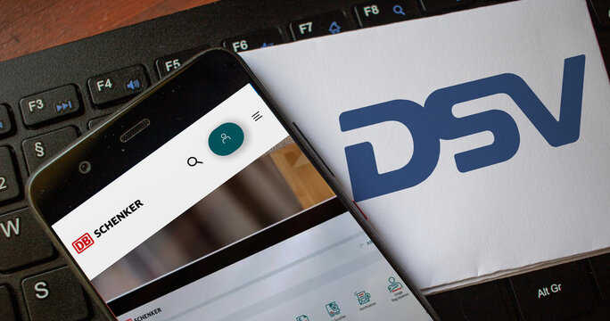 Website of DB Schenker on a smartphone and logo of the danish transport and logistics company DSV