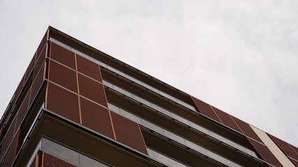 low angle of ventilated facade of modern residential building