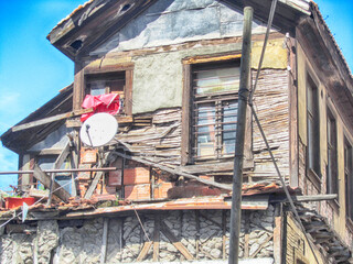 old wall plasters peeled off wooden walls started to rot house