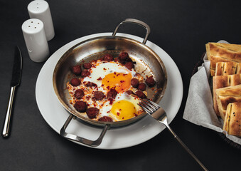 scrambled eggs with sausages