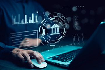 Businessman using the laptop with  bank and tax icons,Concept of tax payment optimisation business finance