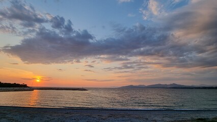 Naklejka premium sunset in monolithi beach preveza city greece longest beach in europe