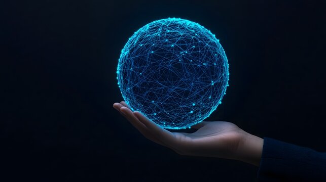 A hand holding a blue sphere with a lot of blue lines surrounding it
