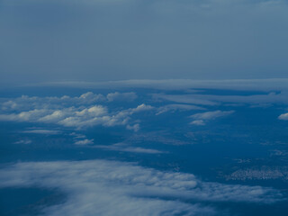 Fototapeta premium view on clouds from airplane window