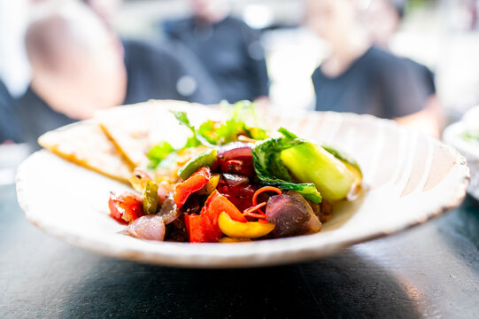 A vibrant plate of grilled vegetables and avocado, showcasing fresh ingredients and vivid colors. Perfect for healthy eating and culinary presentations. Ideal for food blogs and nutrition articles.