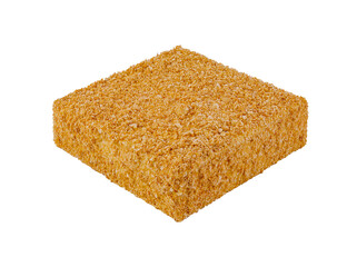 Square honey cake standing on white background