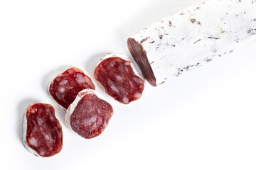 Fuet.Dry cured fuet sausage, isolated on white background.